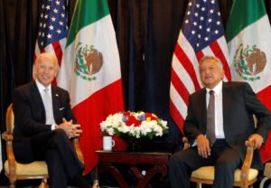 FILE PHOTO: Then-U.S. vice president Joe Biden (L) with Andres Manuel Lopez Obrador, then candidate for president of Mexico in March 2012