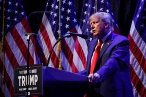 FILE PHOTO: Former U.S. President Trump holds a campaign rally in Davenport, Iowa